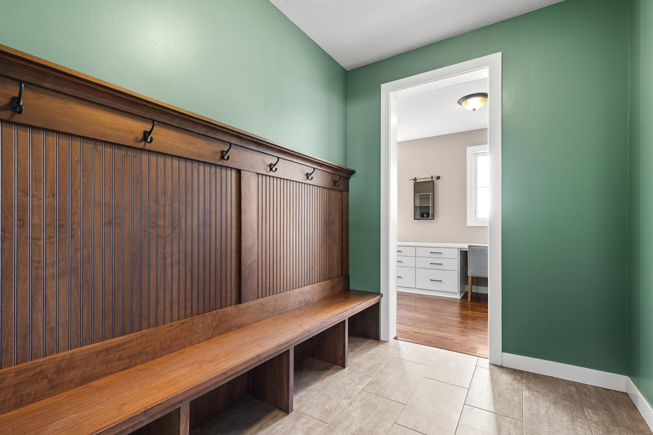 Mudroom leads into home office.