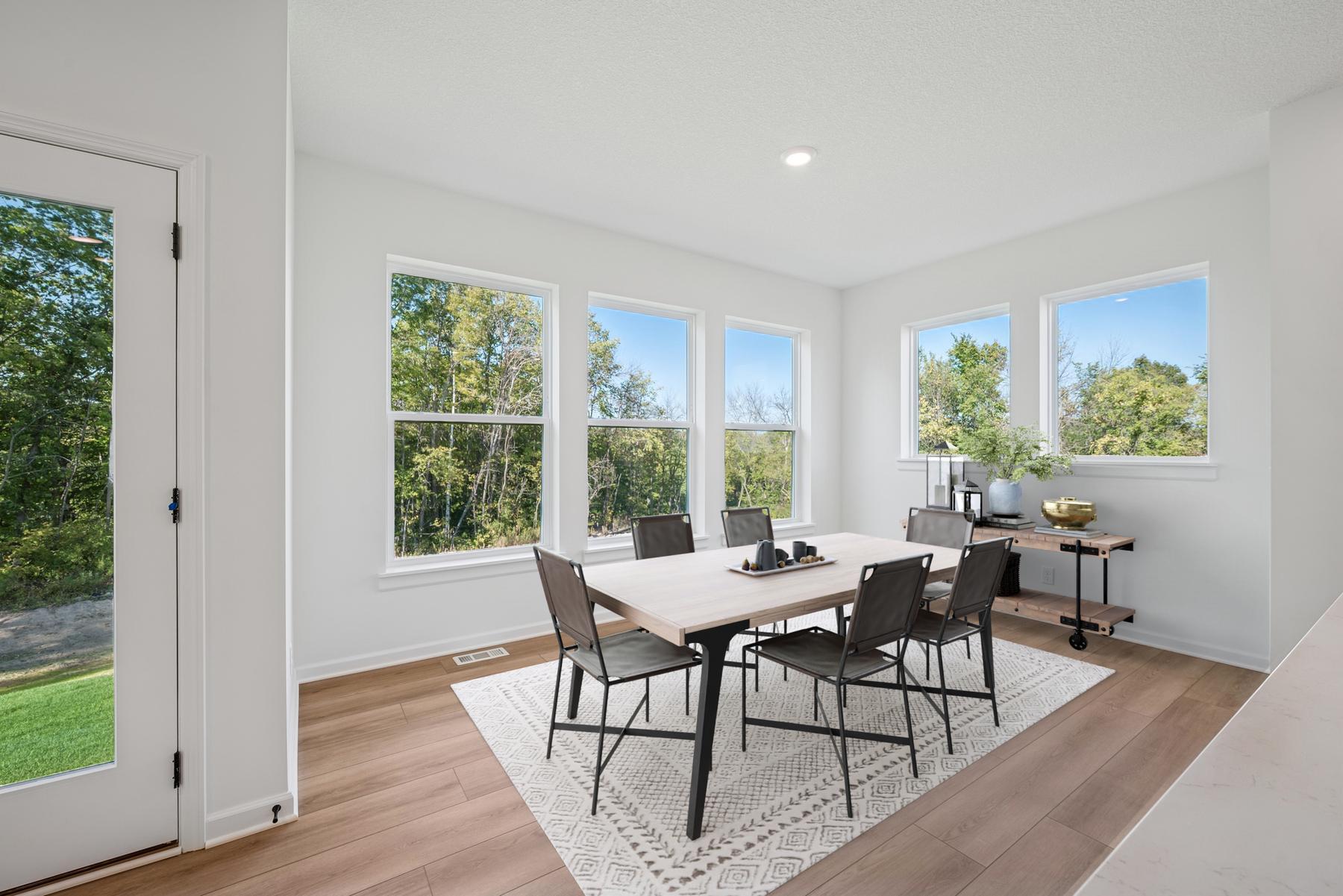 Virtually staged dining room. Photo of previously built Kane. Colors and selections will vary.