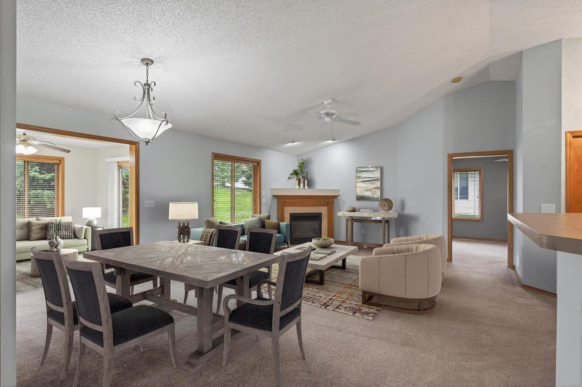 View from Dining area with Gas Fireplace (virtually staged)