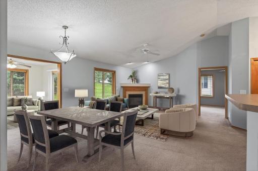 View from Dining area with Gas Fireplace (virtually staged)