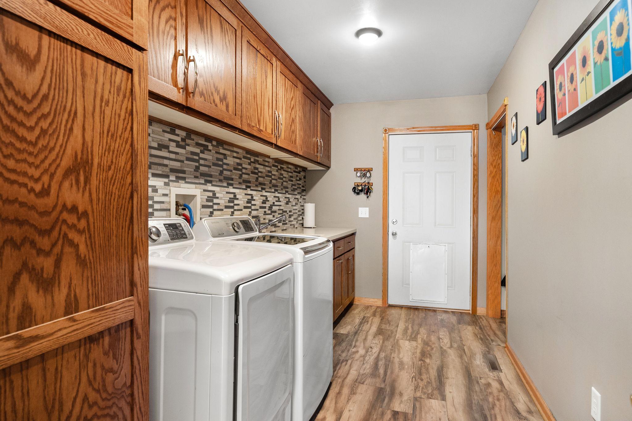 Main Floor Laundry and Pantry with Pullouts