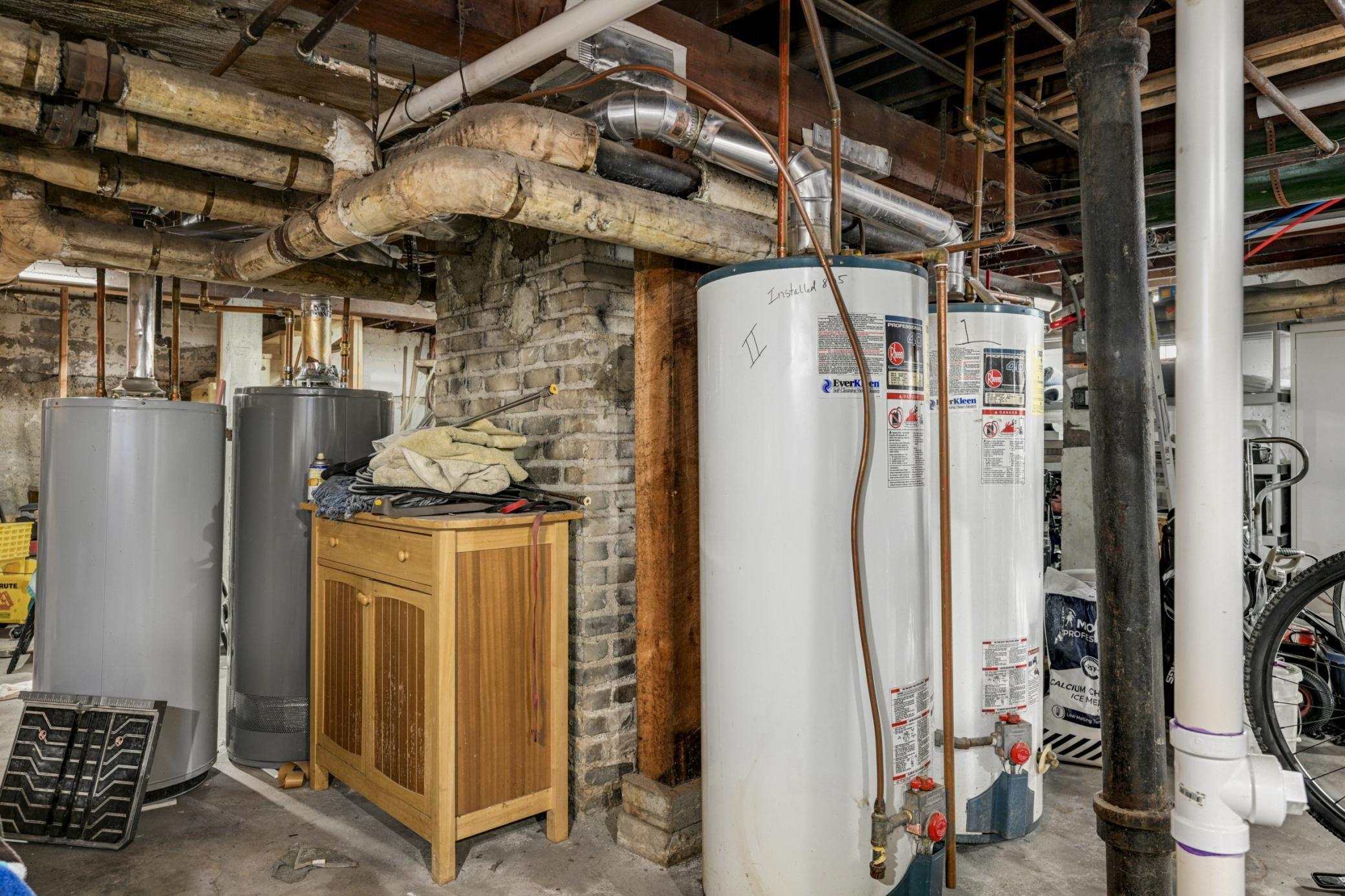 Seperate hot water heaters.