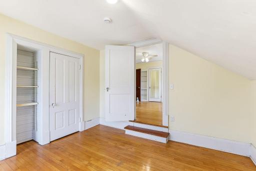 There is a step down from bedroom 2 to this adjacent room.