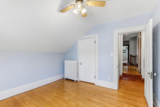 This door opens to a walk-thru closet to another bedroom.