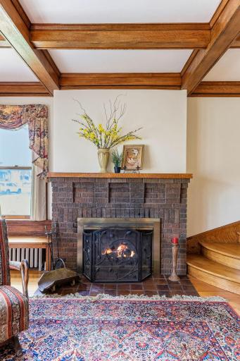 A close-up of the wood burning fireplace.