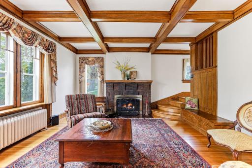 Take notice of the partial staircase that continues up, over and down to the kitchen.