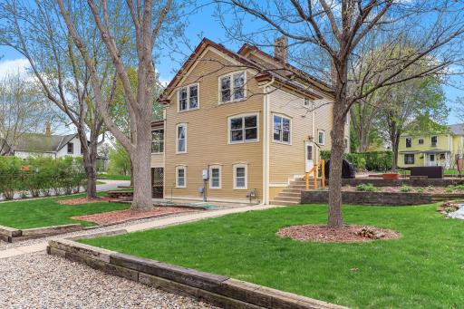 This sidewalk leads from the oversize garage to the back door and large outdoor patio.