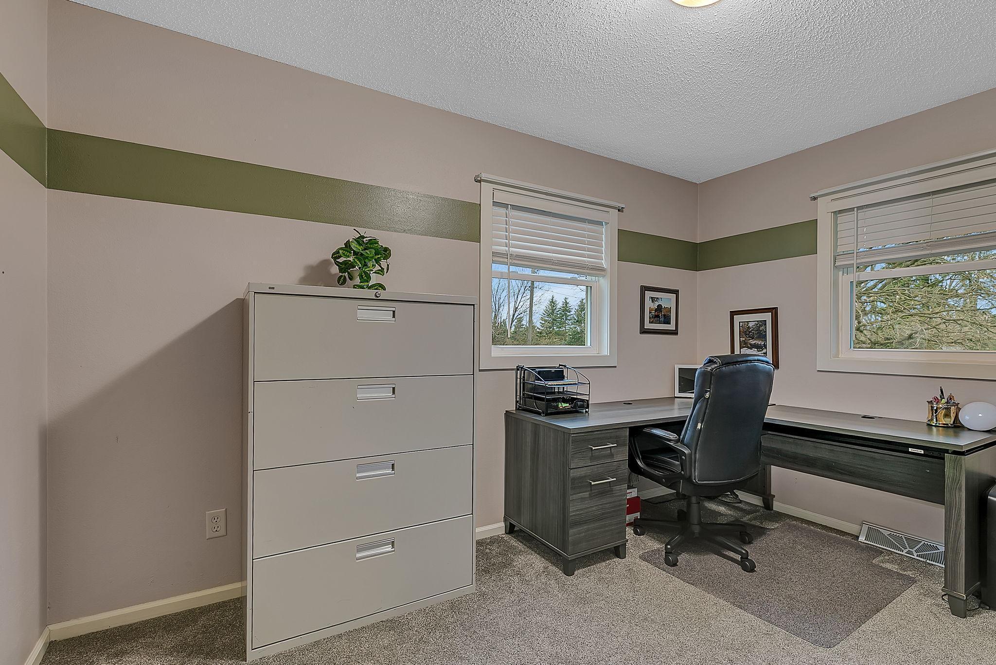 Bedroom 2, currently used as a work from home office.