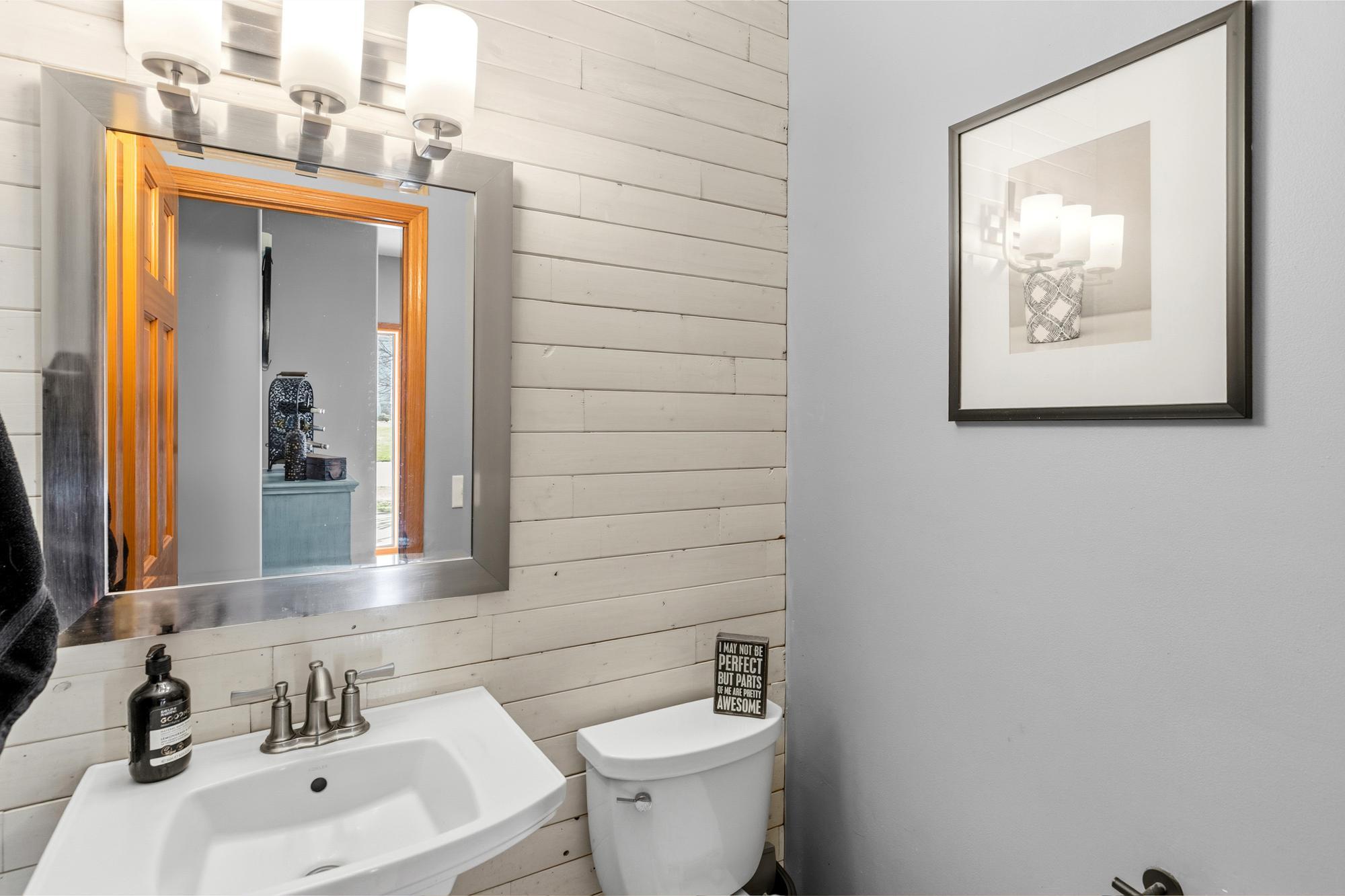 Lovely updated half Bath on the main level.