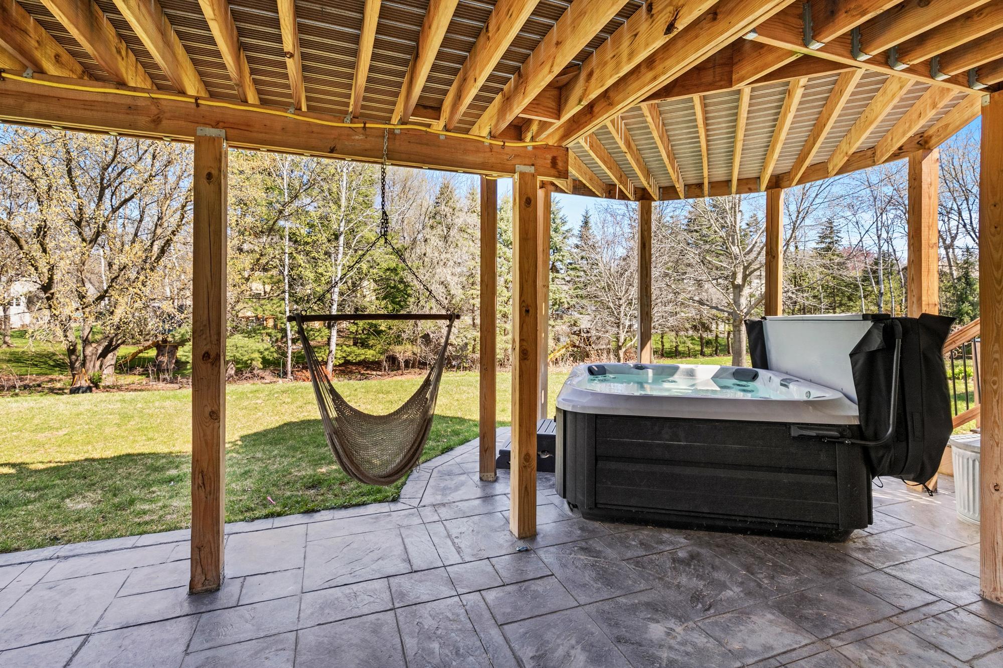 Enjoy quietly reading a book on the beautiful stamped patio. New in 2020.