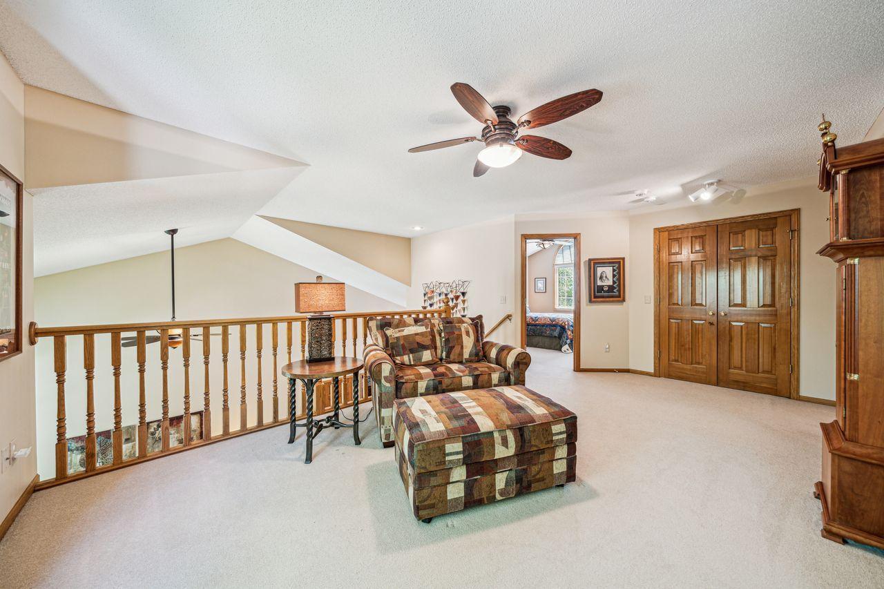 View of sitting area looking towards one of two upper level bedrooms