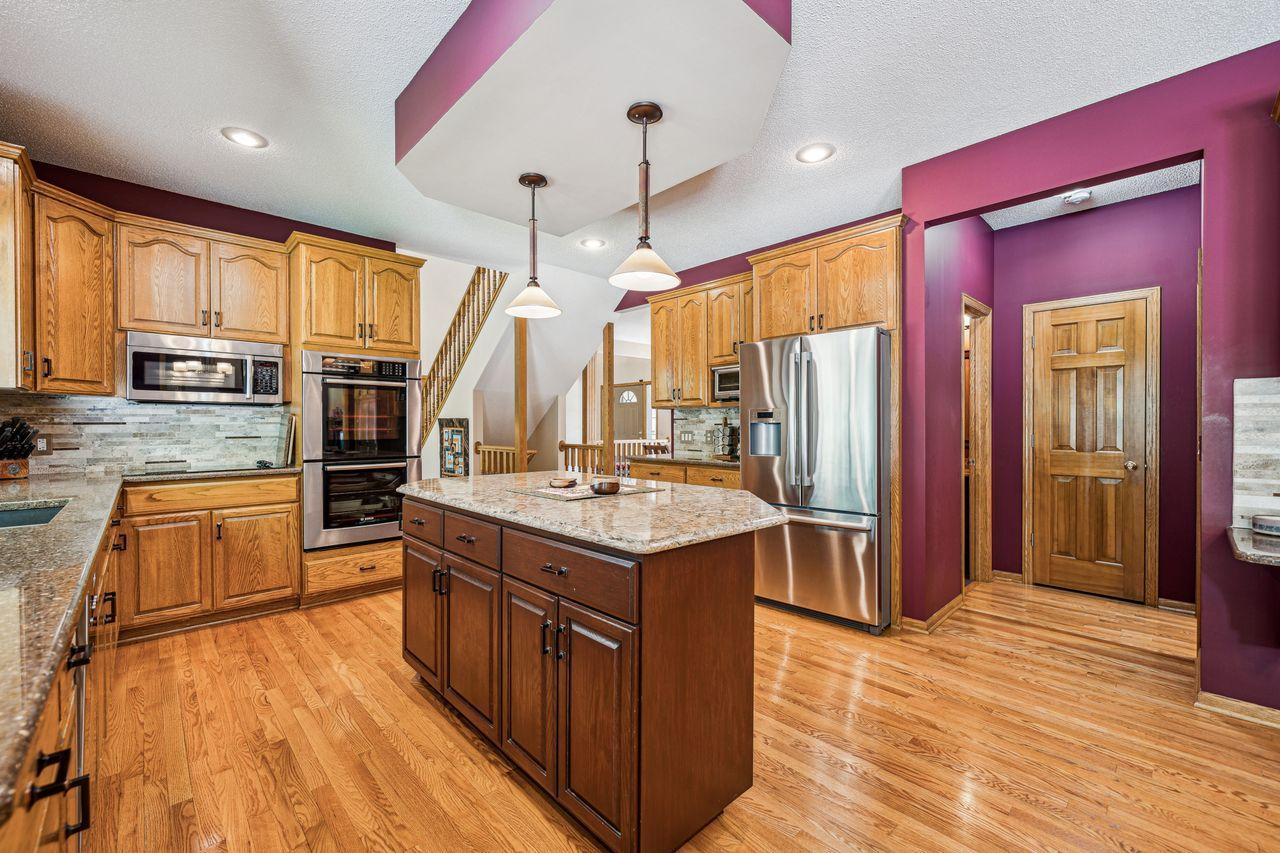 Plenty of cabinets, counter space and double oven.