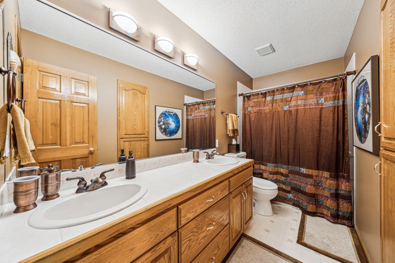 Large upper level full bath with dual vanities