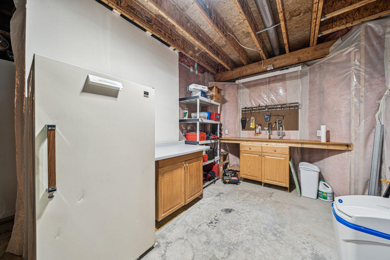 Mechanical area for extra storage and work bench area