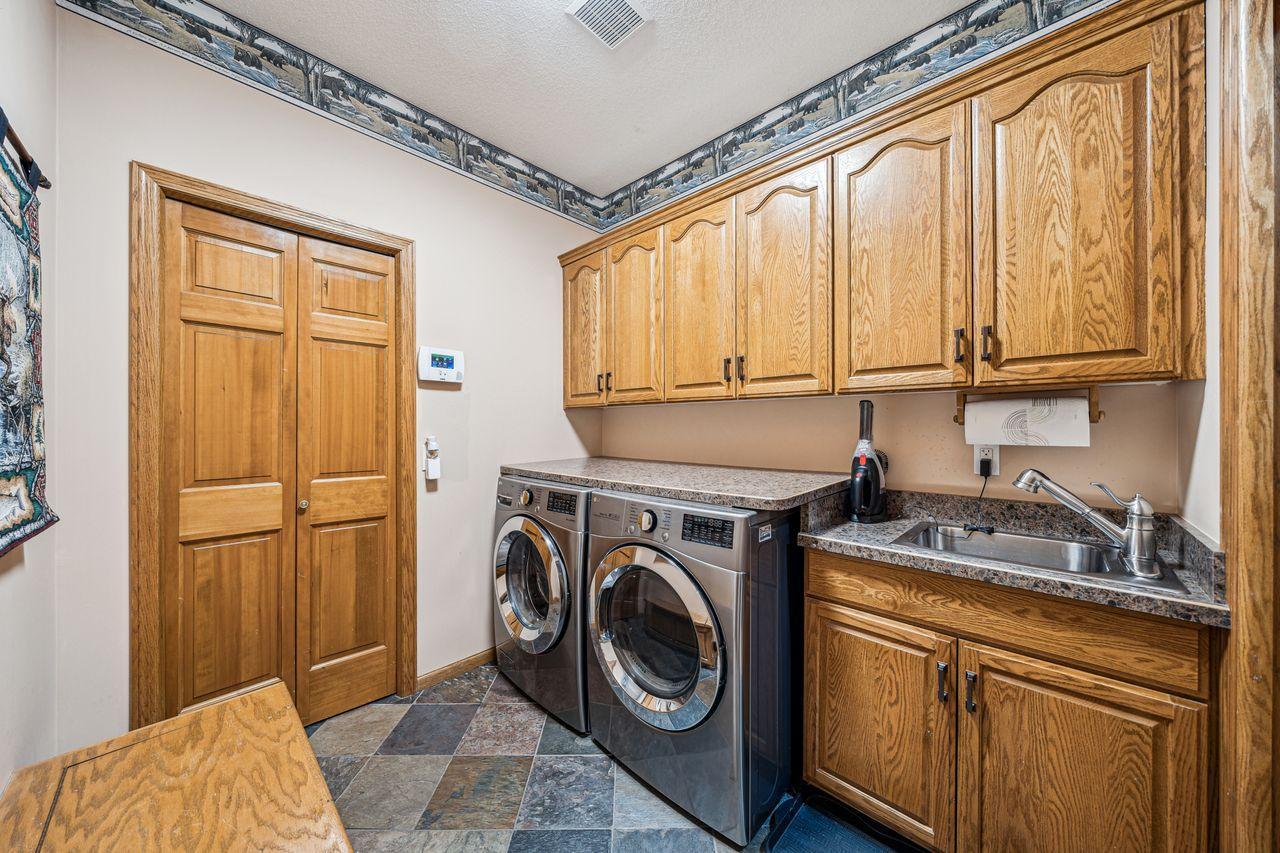 Main floor laundry/mudroom off the entrance from 3 car garage
