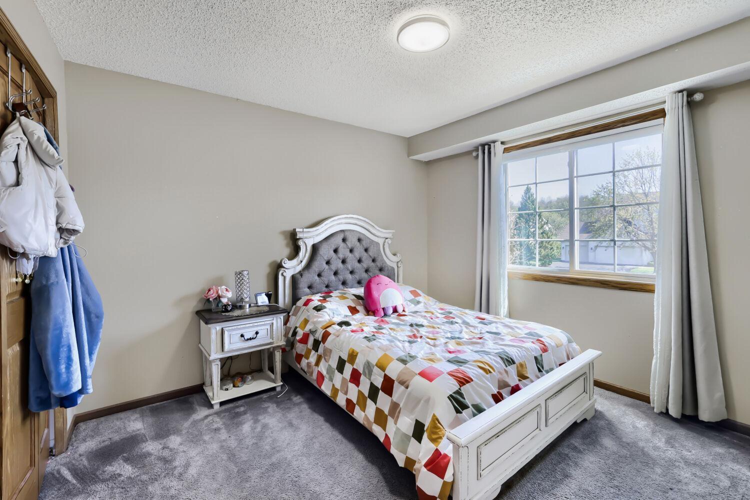 14233 Cobbler Ave - Web Quality - 021 - 21 Bedroom.jpg