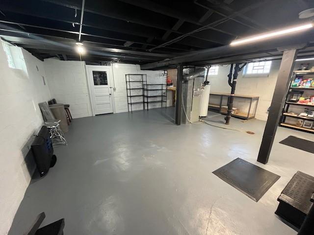 Unfinished lower level has excellent storage or future expansion space.