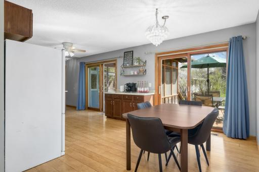 Informal dining space adjacent to both the living room & kitchen. Sliding patio to the outdoor deck - great for grilling!