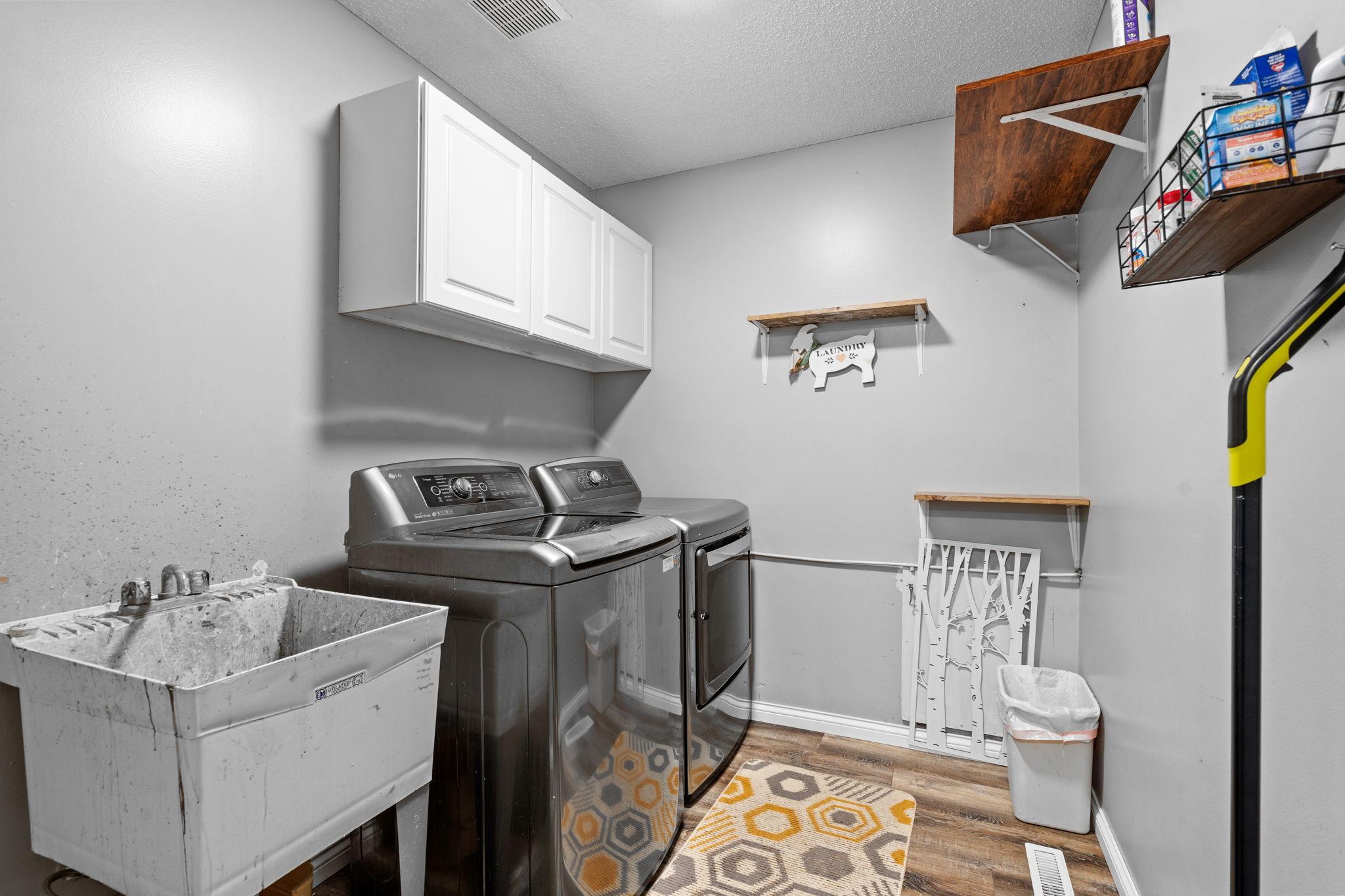 Functional main-level laundry and mudroom conveniently located just off the garage entry.