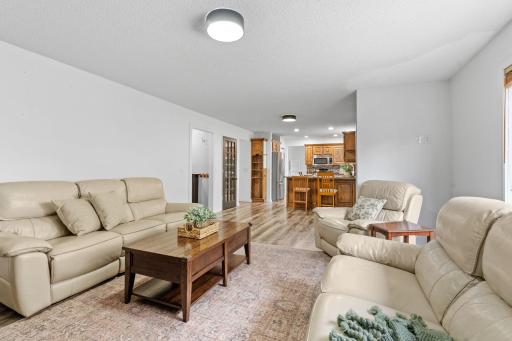 Thoughtfully updated gathering space with modern finishes, warm tones, and excellent flow throughout the main level.