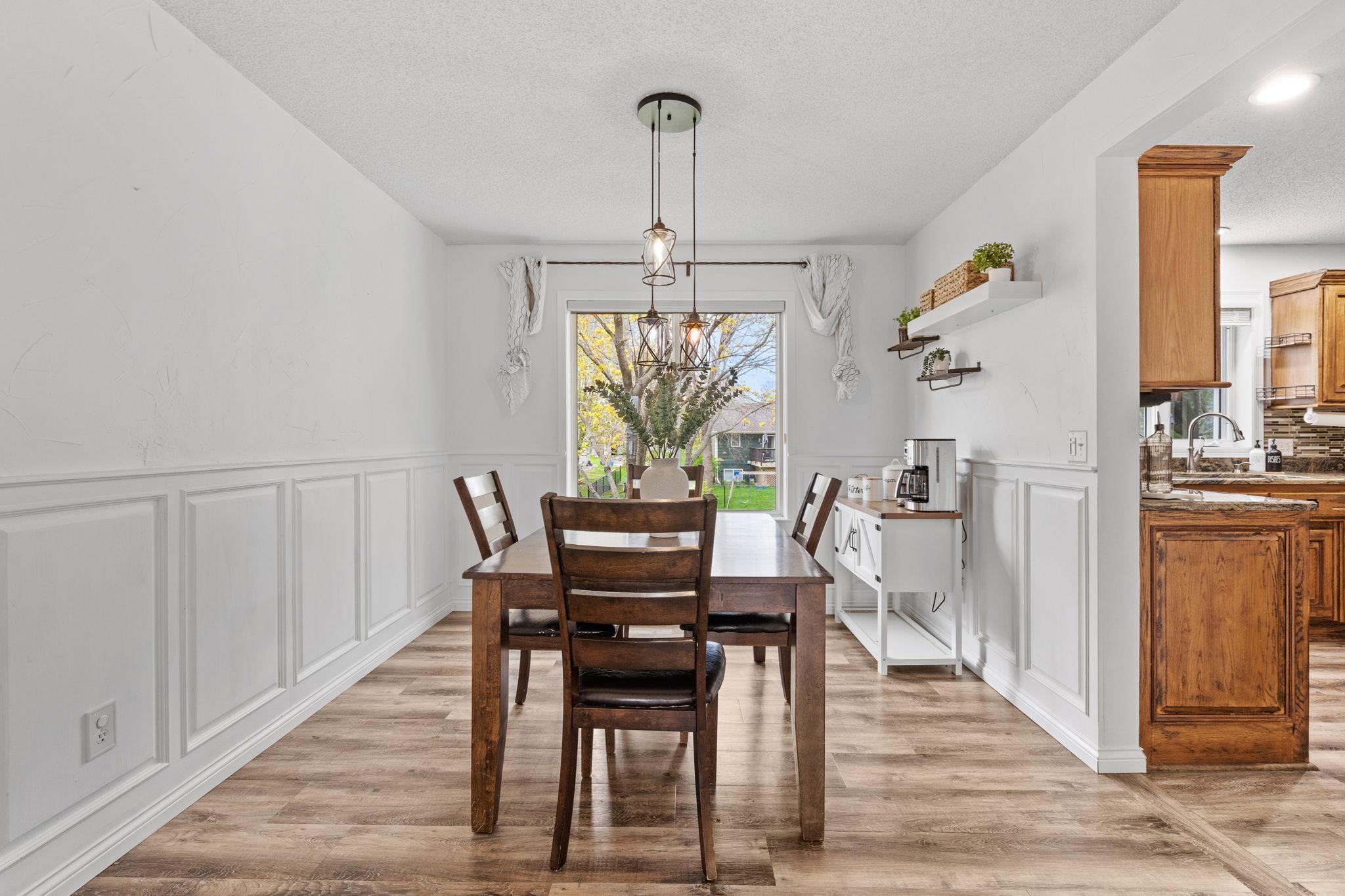 Elegant dining area seamlessly connected to the formal living space, perfect for entertaining and everyday gatherings.