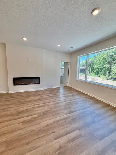 Beautiful view of the tree line from where you relax in front of the fire/TV.