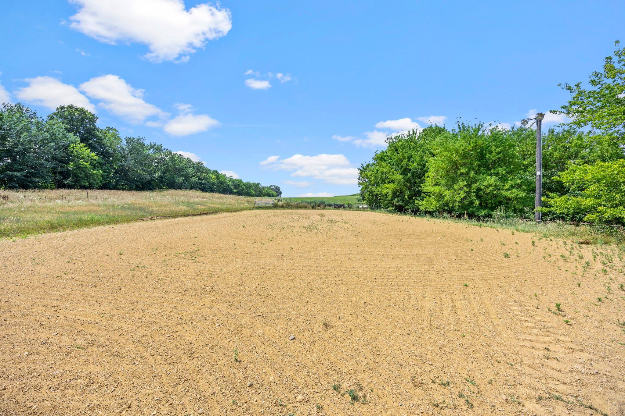 Large groomed outdoor riding arena!