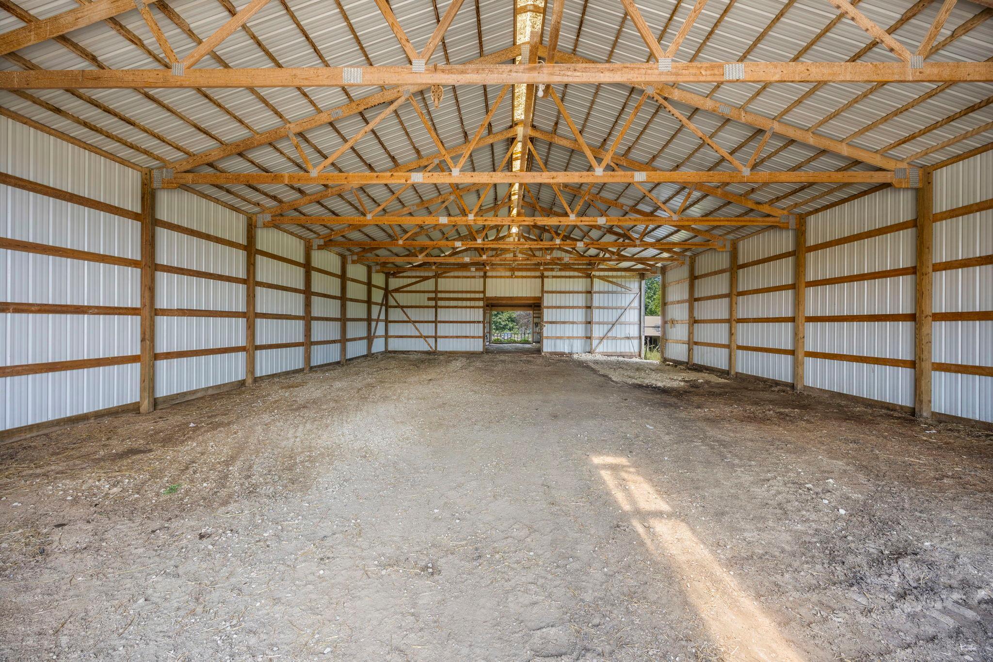 Both pole buildings are freshly groomed and power washed inside & out.