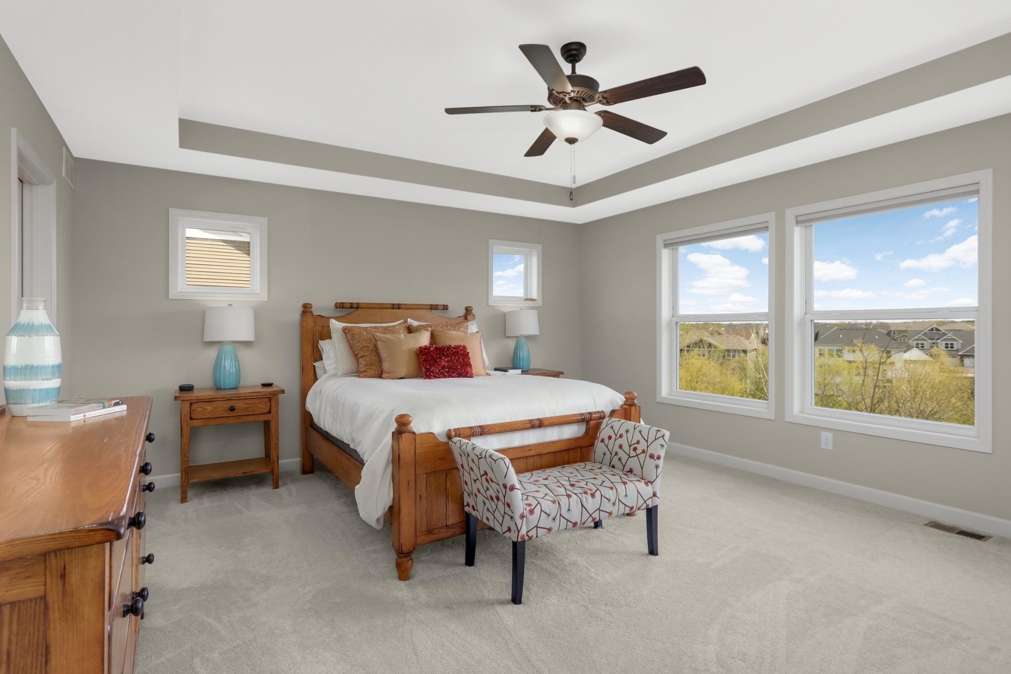 Stunning views of the backyard from the spacious primary suite.