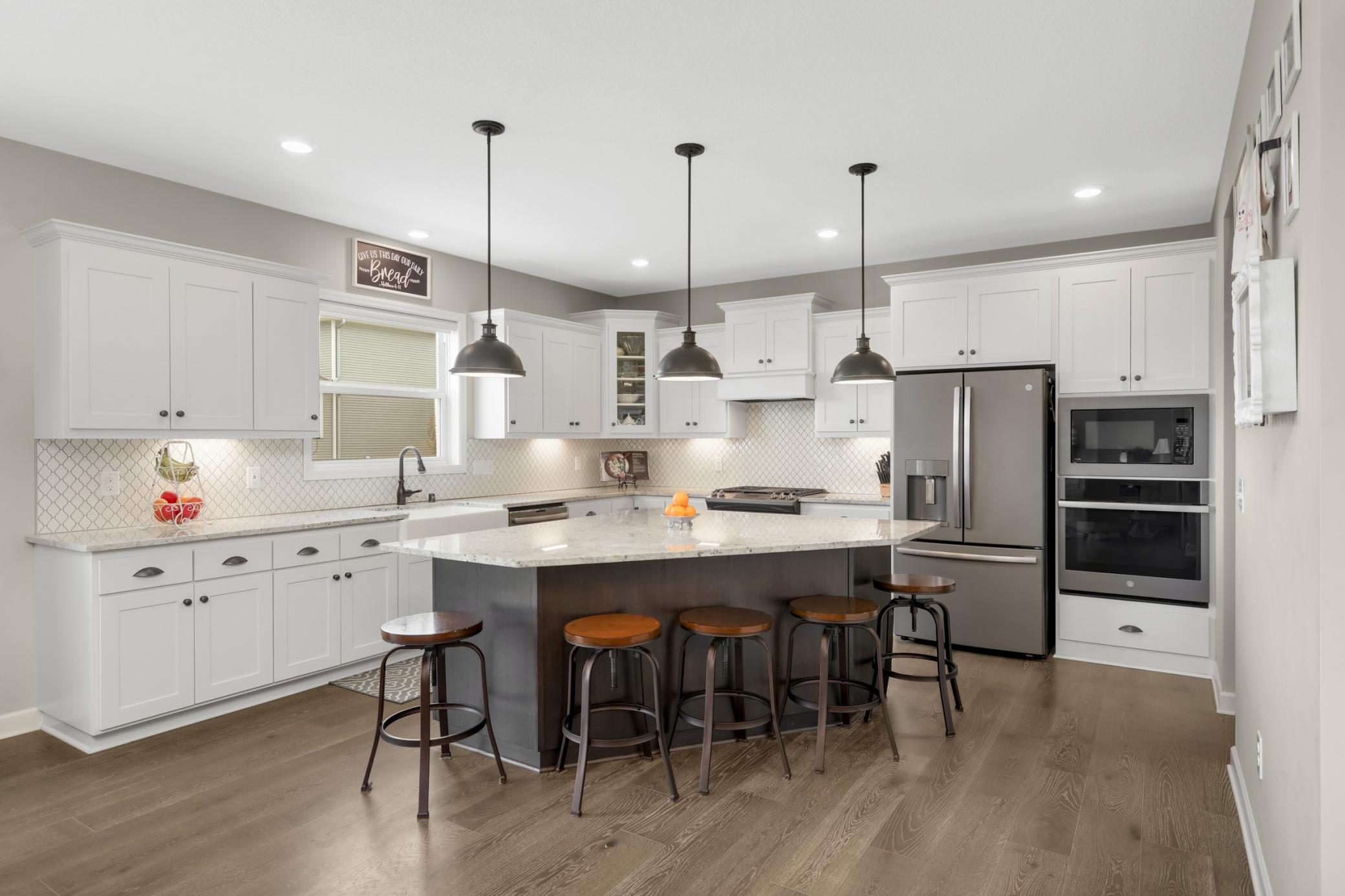 You will love this huge center island with pendant lighting!