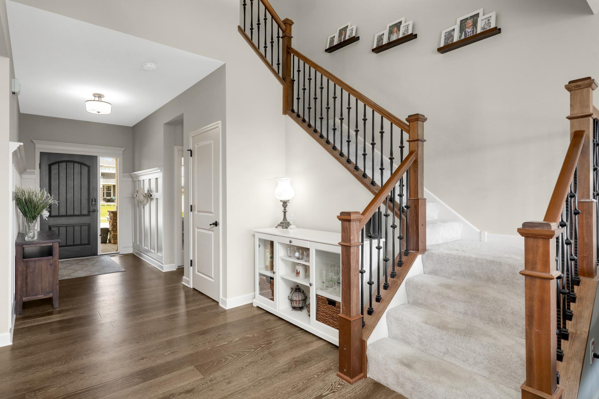 Note the stunning wood and rod banister..