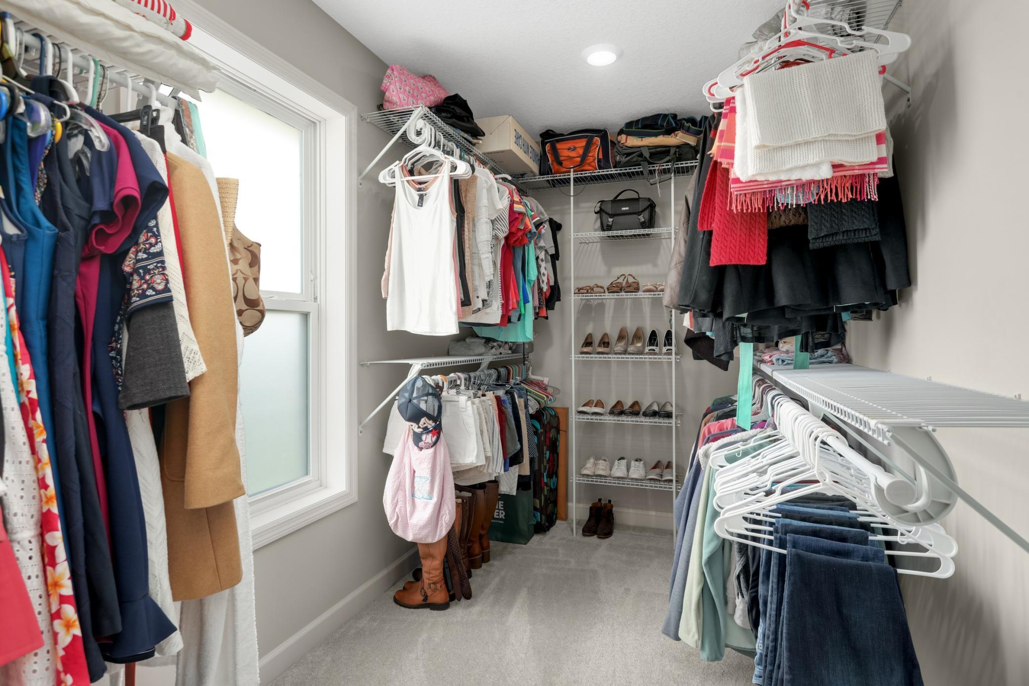 One of the primary walk-in closets.