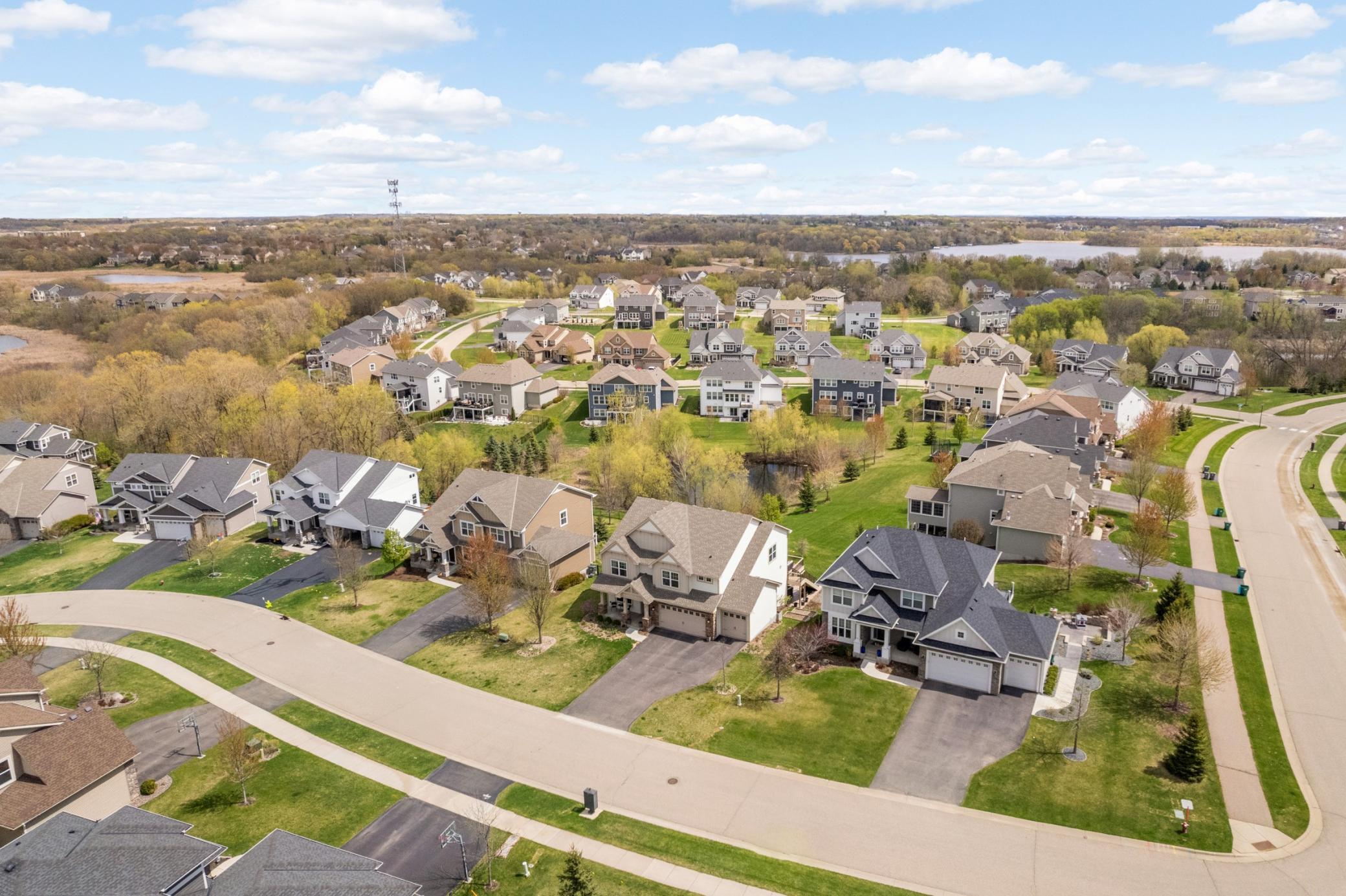 Home is ideally situated on a serene lot with pond views.