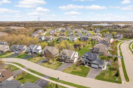 Home is ideally situated on a serene cul-de-sac lot with pond views.