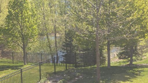 Another seasonal view of the beautiful pond setting in your backyard!