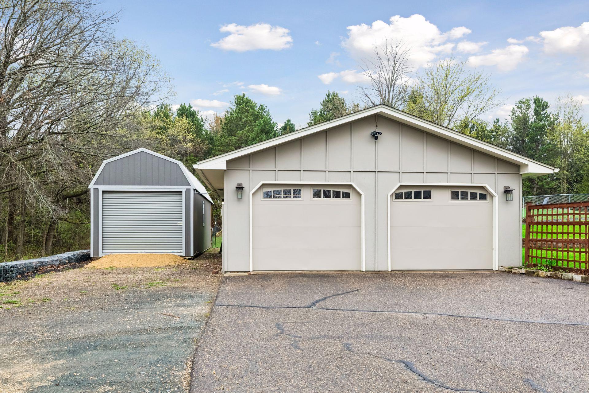 A spacious 2+ car garage and an large shed round out the property, delivering excellent storage and functional workspace options.