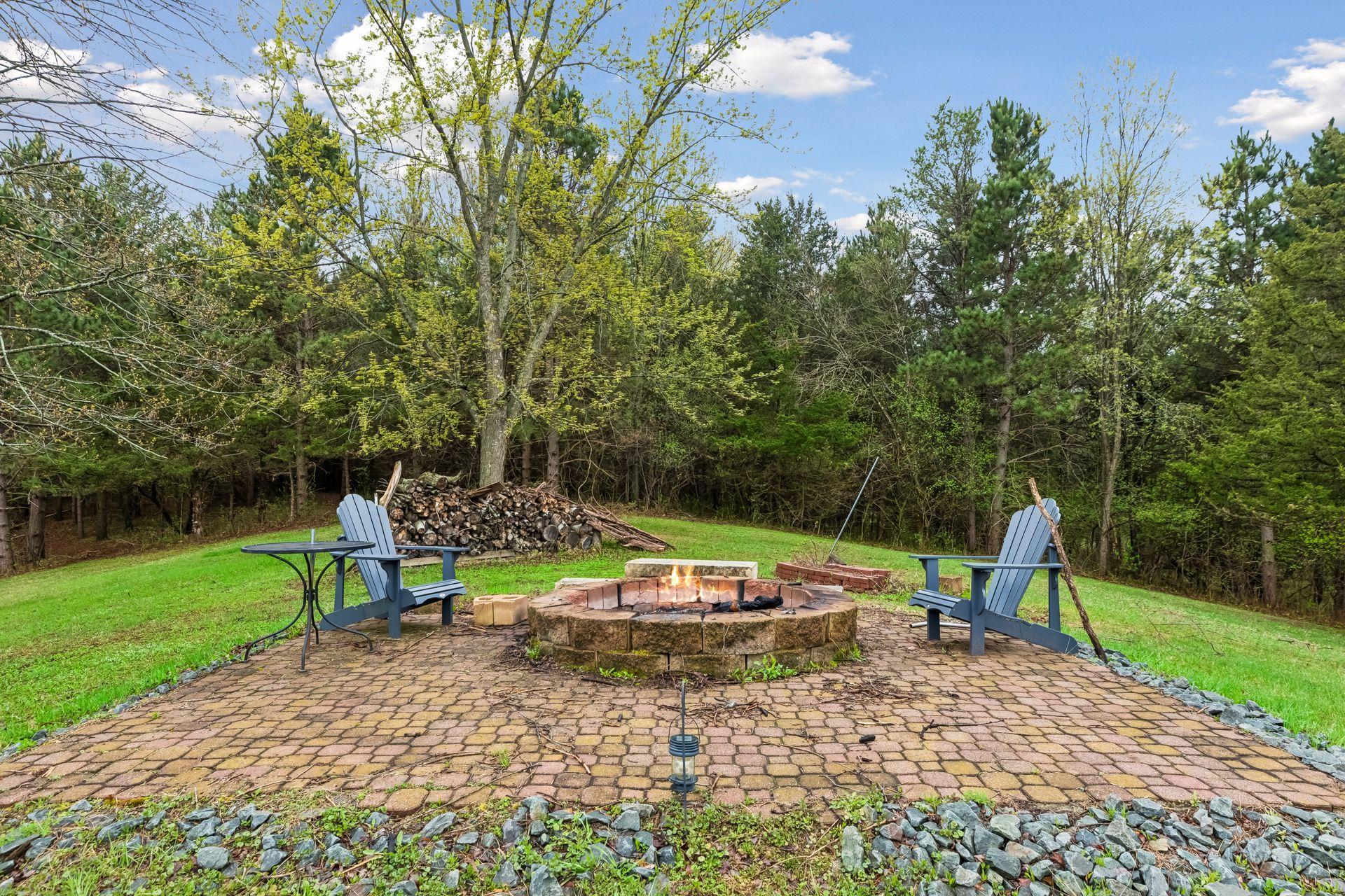 Large paver firepit area, perfect for gathering on cool evenings and enjoying summer nights!