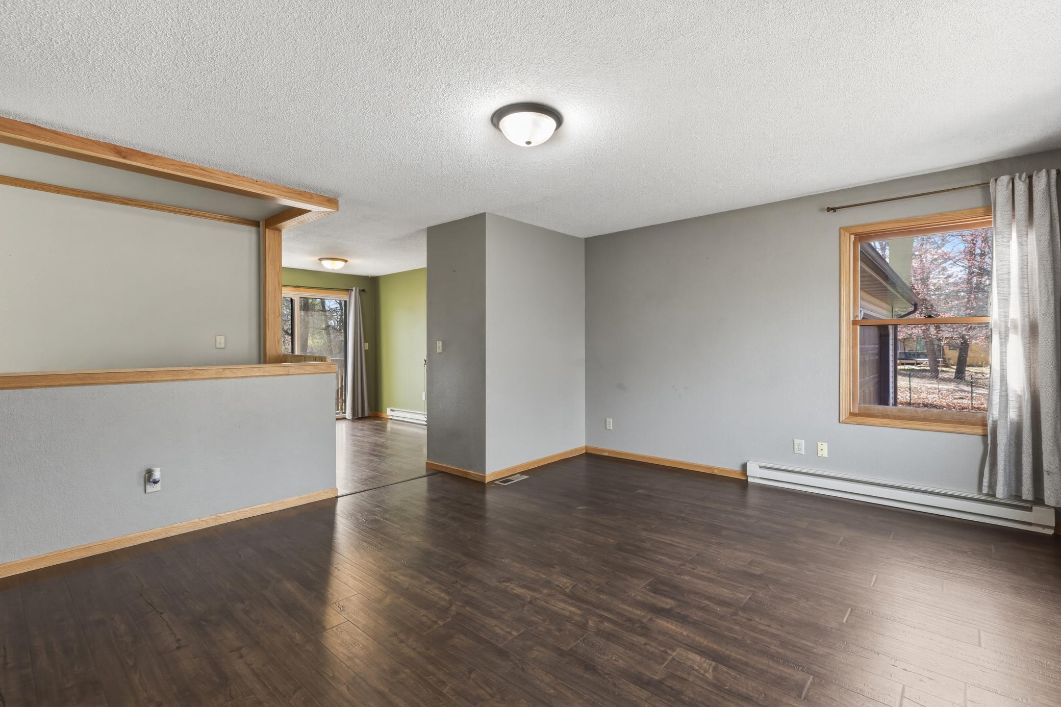 The living room flows right into the dining area and kitchen