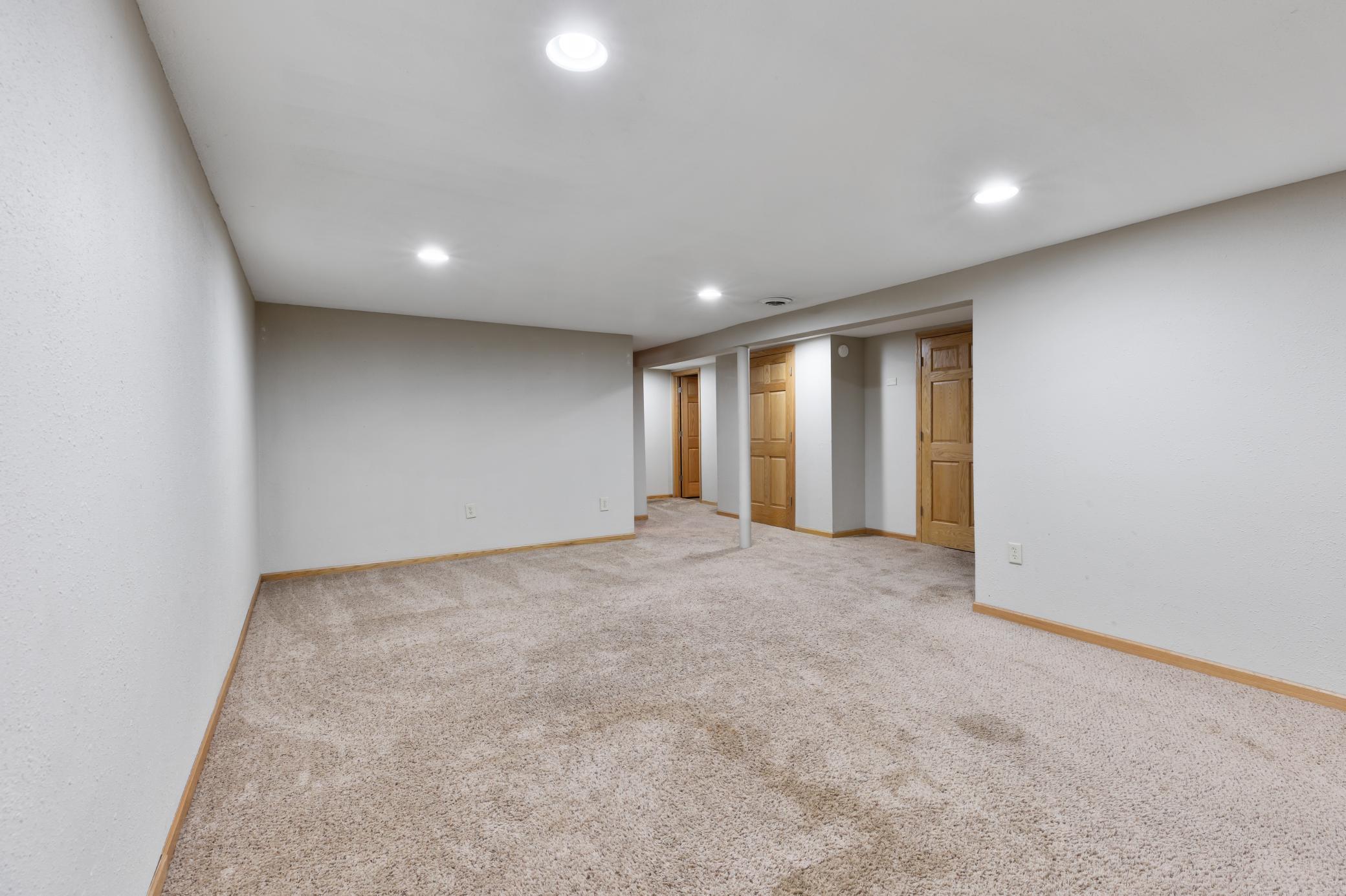 Large family room that has enough space for several different uses.