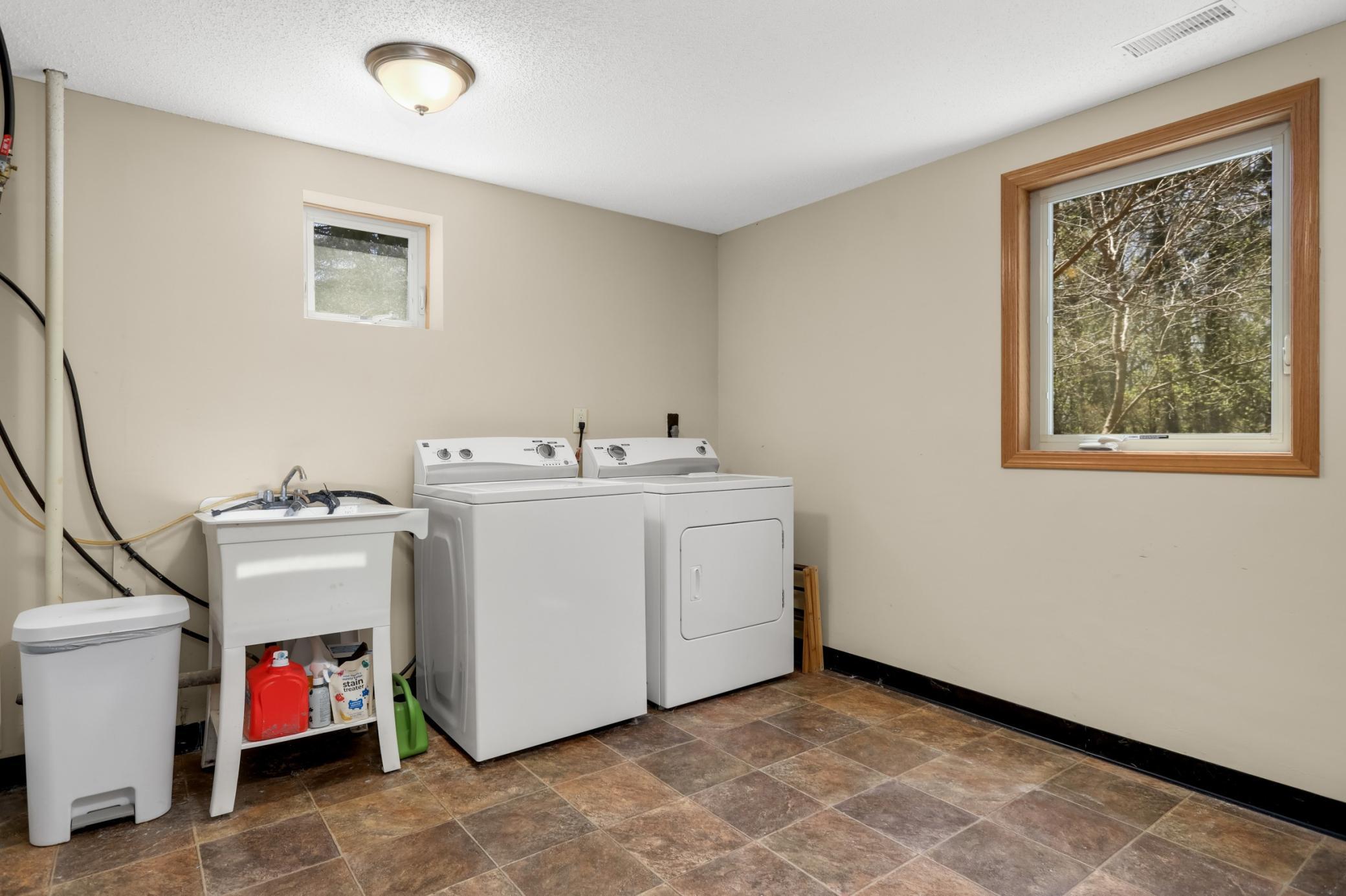 Laundry room is large and ample space for extra storage.
