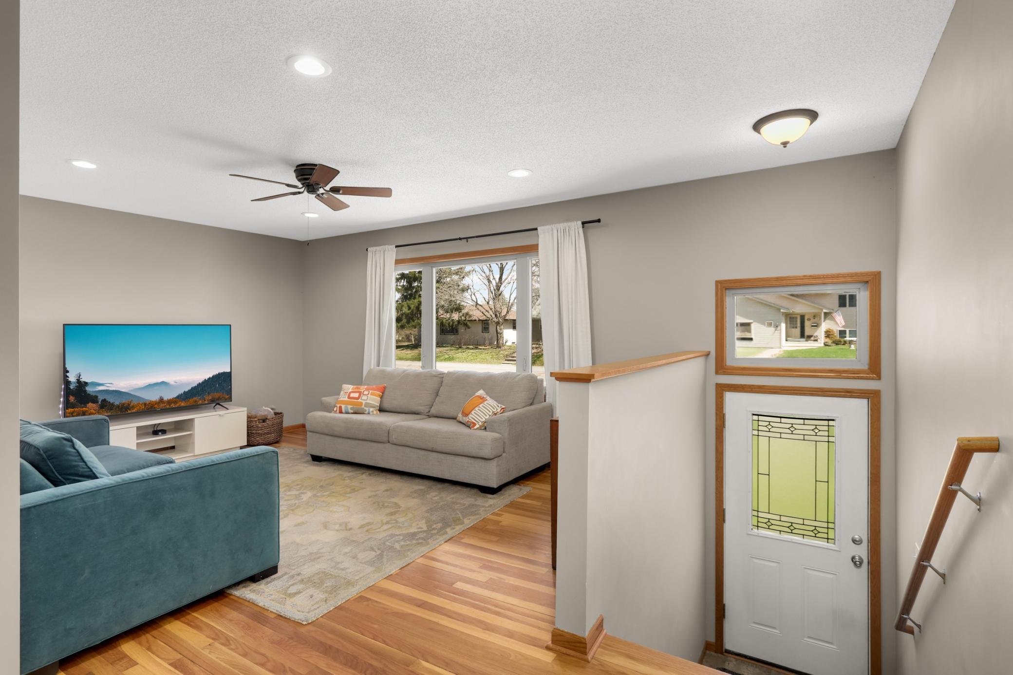 Front entrance, main floor has beautiful wooded floors in living room and bedrooms.