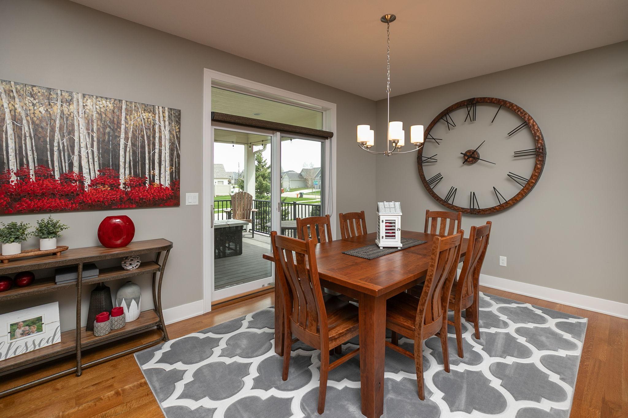 Access the covered patio through the dining area