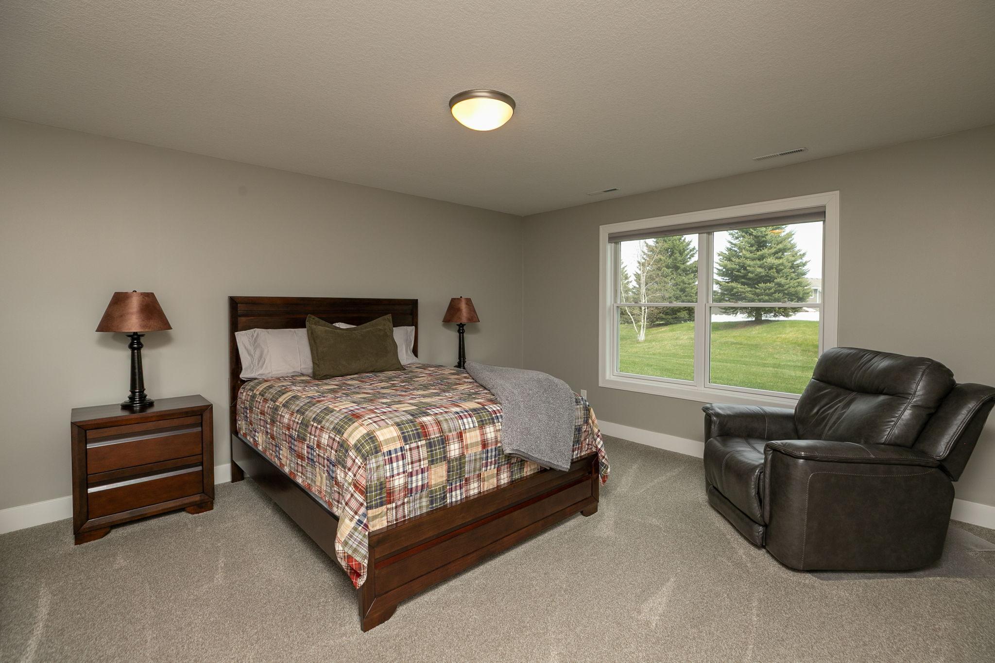 Third bedroom in lower level. Note the spaciousness of both of these lower bedrooms