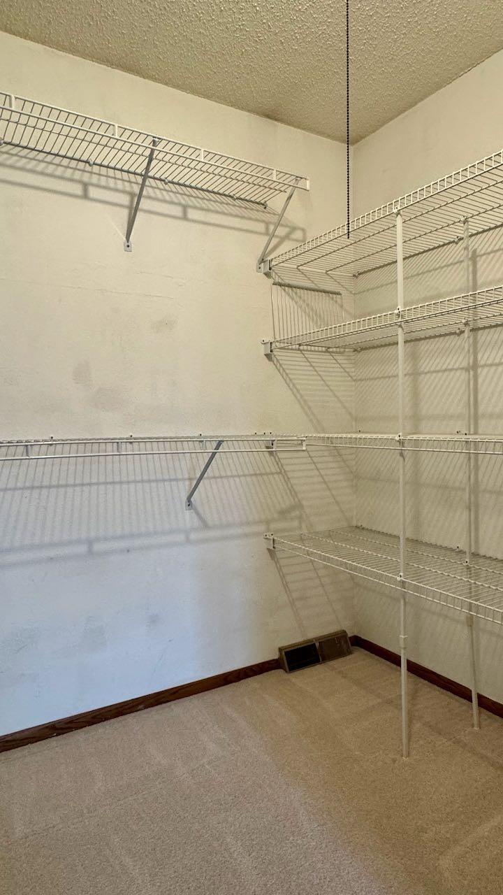 (46) Upstairs Bedroom 1 Walk In Closet.jpeg