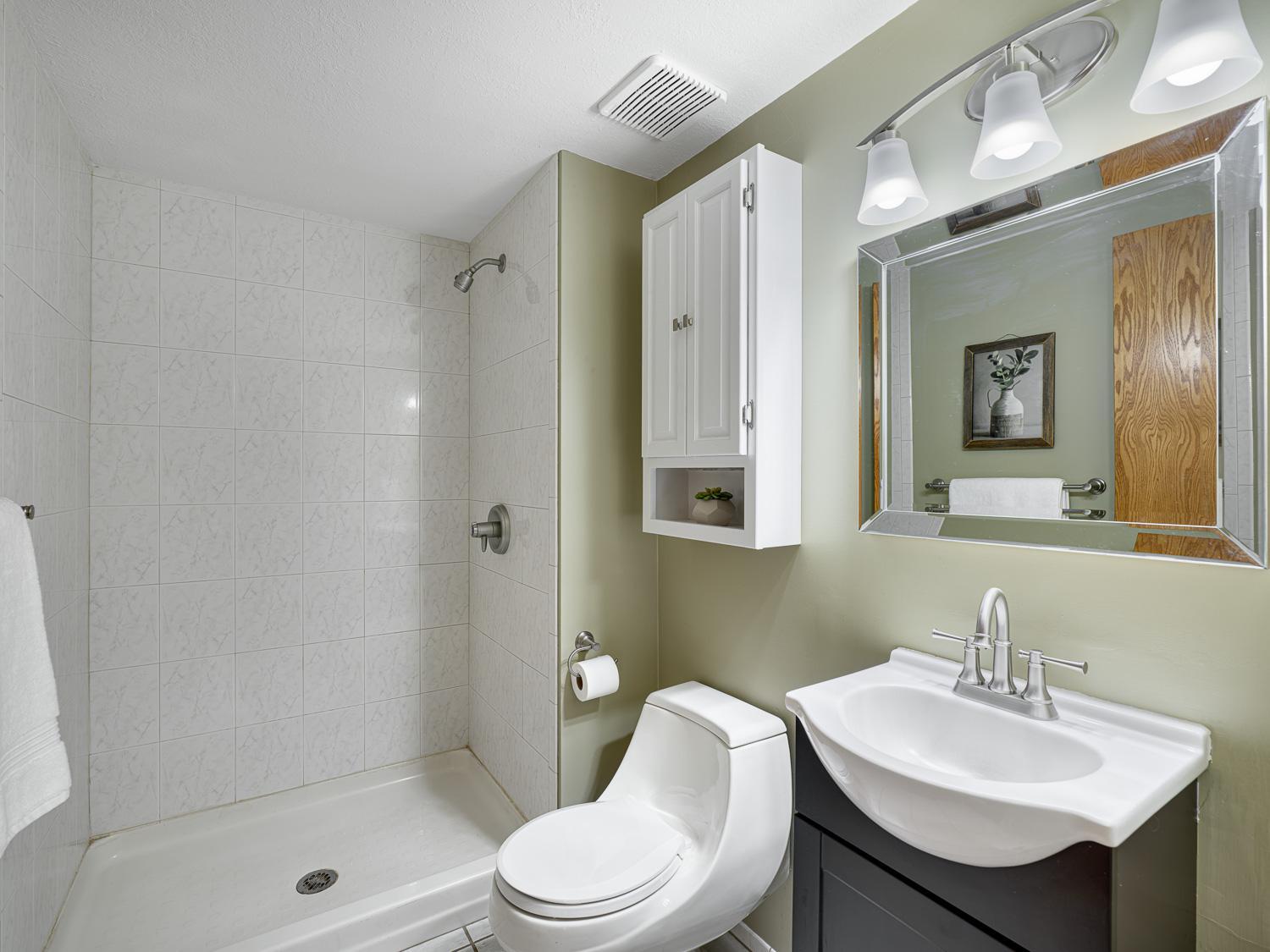 This conveniently located 3/4 bath is ideal for guests and everyday use.