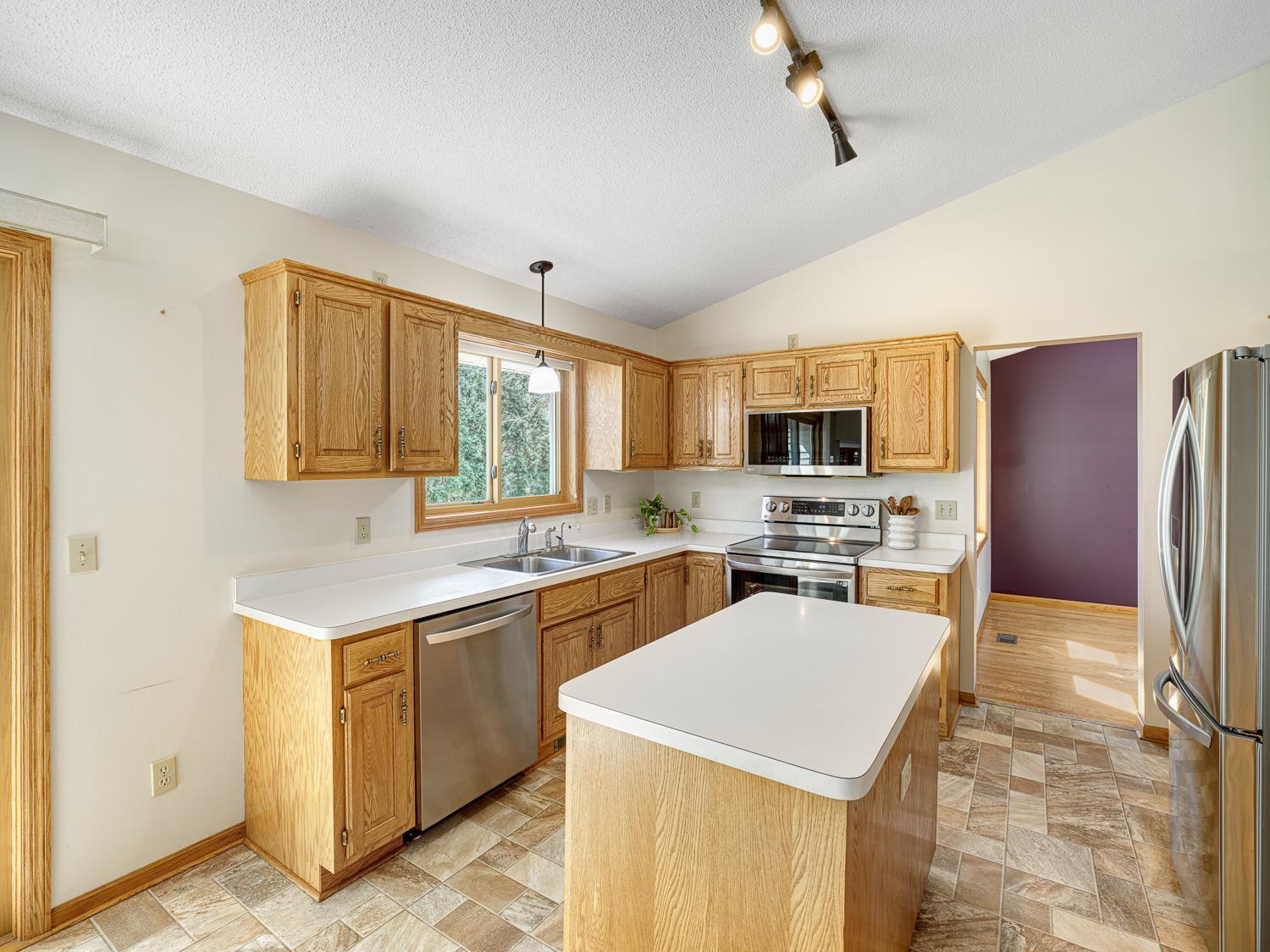 Stainless steel appliances create a clean, cohesive look that is easy to maintain.