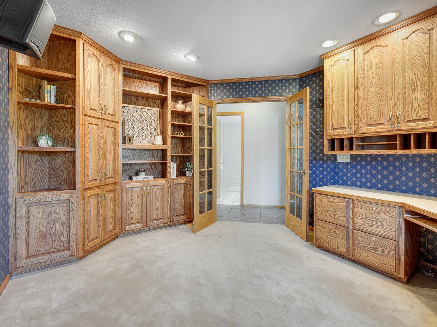 Tucked just off the family room, this office offers privacy with french doors, while staying connected to the main living spaces.