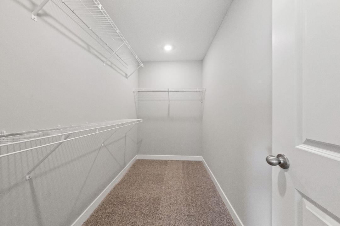 Primary Suite walk-in closet.