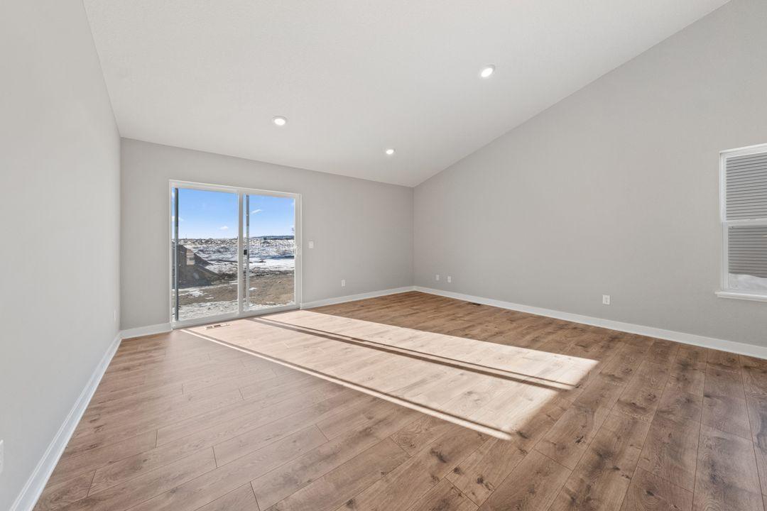 Family room. Actual home will include a corner, electric fireplace.