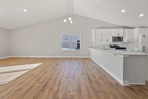 Large peninsula island with room for ample seating plus dining space.